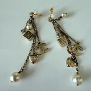 CHANEL CC gold tassel earrings  Authentic